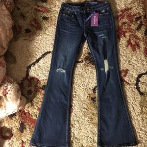 Bootcut darkwash Vigoss skinny jeans with rips